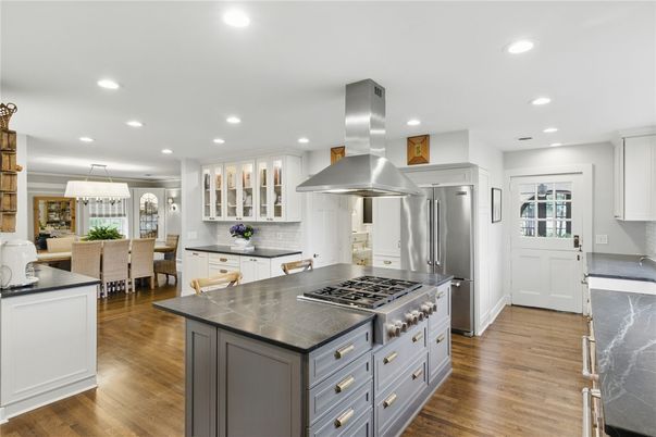 Chandelier, Dining room, Interior, Kitchen, Recessed Lighting, Stainless Steel Appliances, Wood Texture Flooring