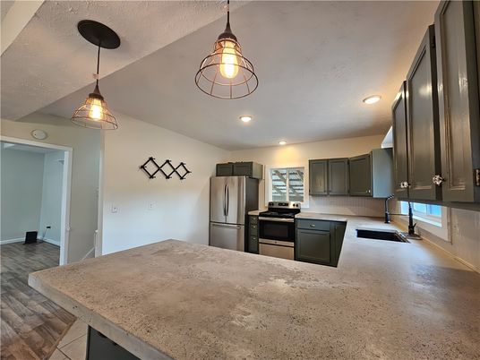 Interior, Kitchen, Pendant Lights, Recessed Lighting, Stainless Steel Appliances, Wood Texture Flooring