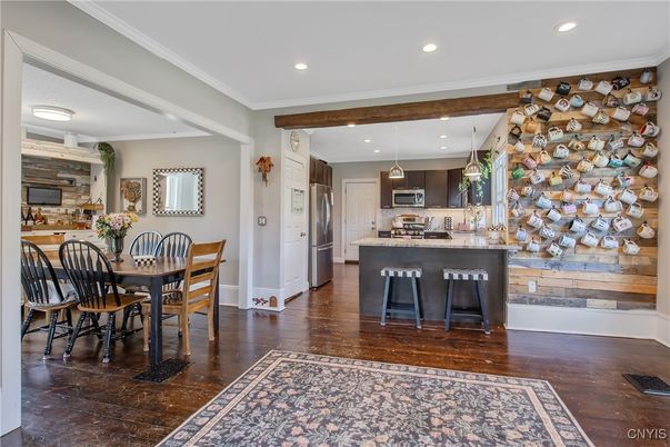Dining room, Interior, Kitchen, Pendant Lights, Recessed Lighting, Stainless Steel Appliances, Wood Texture Flooring