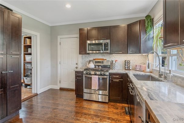 Interior, Kitchen, Recessed Lighting, Stainless Steel Appliances, Wood Texture Flooring