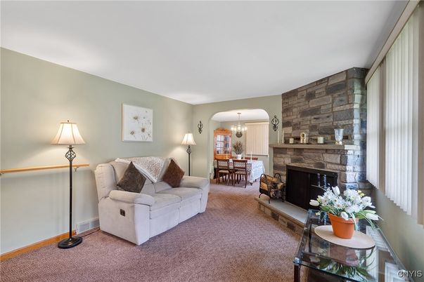 Chandelier, Dining room, Fireplace, Interior, Living room, Stone Walls