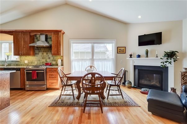 Dining room, Fireplace, Interior, Kitchen, Recessed Lighting, Wood Texture Flooring