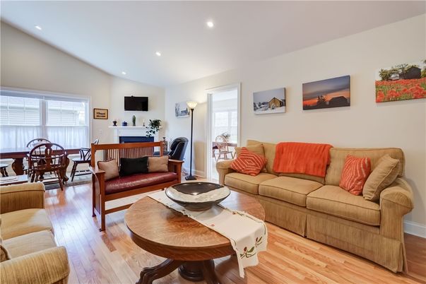 Dining room, Fireplace, Interior, Living room, Recessed Lighting, Wood Texture Flooring