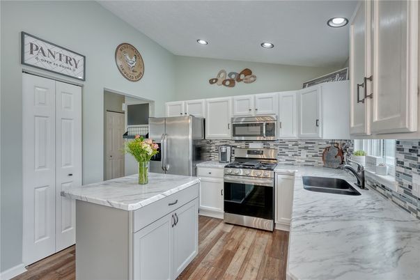 Interior, Kitchen, Recessed Lighting, Stainless Steel Appliances, Wood Texture Flooring