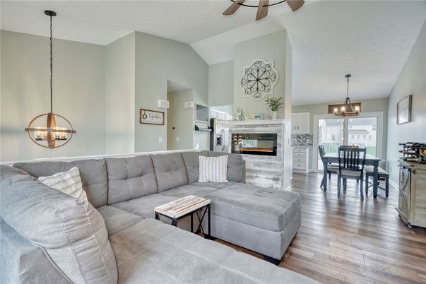 Chandelier, Dining room, Fireplace, Interior, Living room, Pendant Lights, Wood Texture Flooring