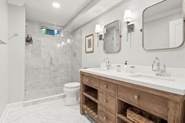 Bathroom, Dual Sink Vanities, Glass Shower, Interior, Marble, Marble Walls, Recessed Lighting