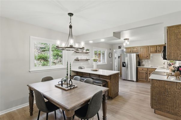 Dining room, Interior, Kitchen, Pendant Lights, Stainless Steel Appliances, Wood Texture Flooring