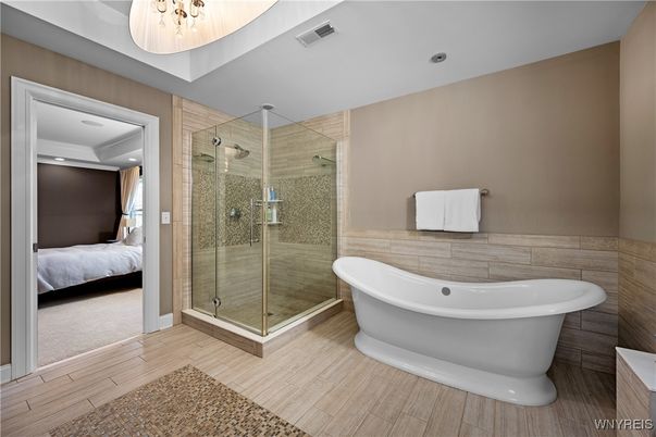 Bathroom, Bedroom, Free Standing Baths, Glass Shower, Interior, Recessed Lighting, Wood Texture Flooring