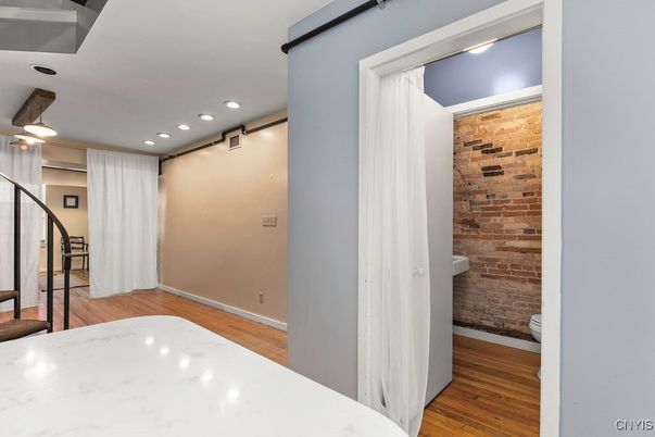 Interior, Recessed Lighting, Stone Walls, Wood Texture Flooring