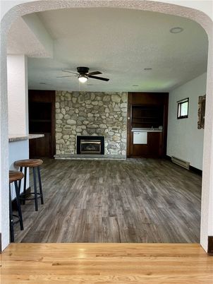 Empty room, Fireplace, Interior, Stone Walls, Wood Texture Flooring
