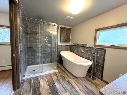 Bathroom, Free Standing Baths, Glass Shower, Interior, Wood Texture Flooring