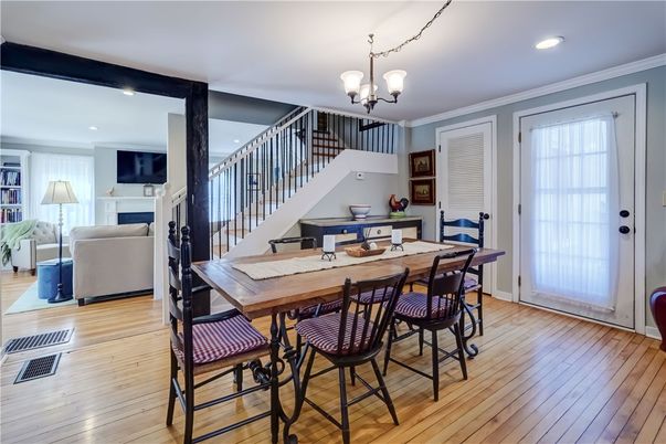 Chandelier, Dining room, Fireplace, Interior, Living room, Recessed Lighting, Wood Texture Flooring