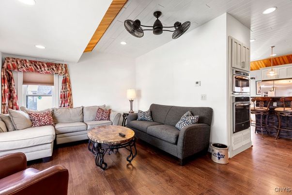 Dining room, Interior, Kitchen, Living room, Pendant Lights, Recessed Lighting, Stainless Steel Appliances, Wood Texture Flooring