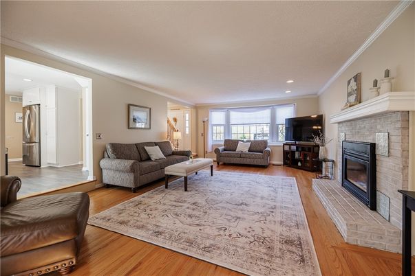 Fireplace, Interior, Kitchen, Living room, Recessed Lighting, Wood Texture Flooring