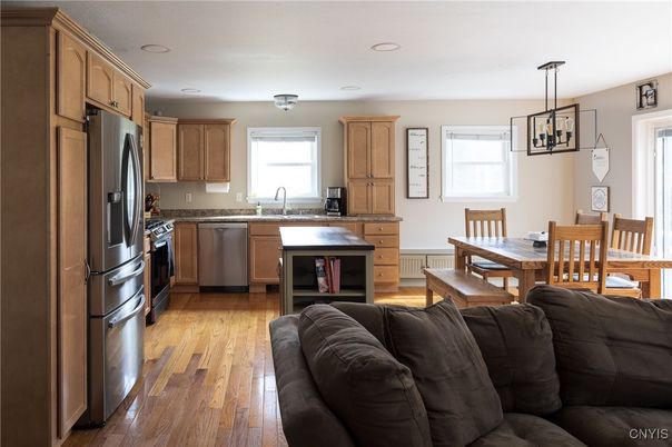Dining room, Interior, Kitchen, Pendant Lights, Recessed Lighting, Stainless Steel Appliances, Wood Texture Flooring