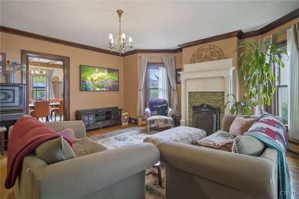 Chandelier, Dining room, Fireplace, Interior, Living room, Wood Texture Flooring