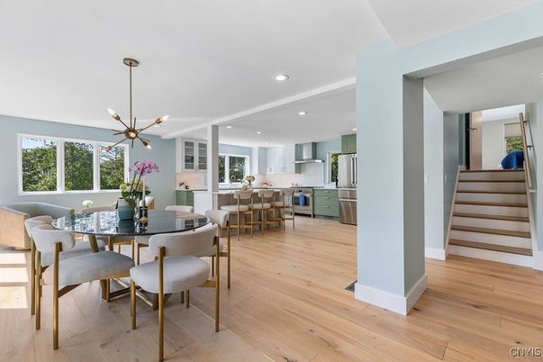 Dining room, Interior, Kitchen, Pendant Lights, Recessed Lighting, Stainless Steel Appliances, Wood Texture Flooring
