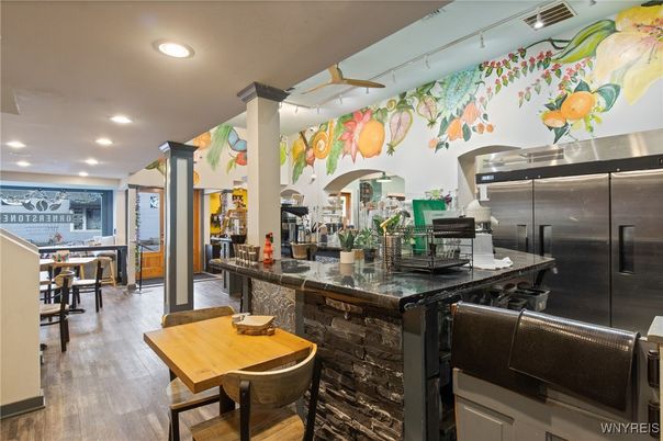 Dining room, Interior, Kitchen, Recessed Lighting, Stainless Steel Appliances, Wood Texture Flooring