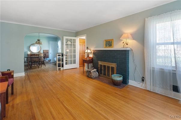 Dining room, Fireplace, Interior, Pendant Lights, Wood Texture Flooring