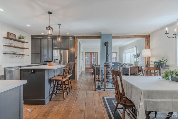 Dining room, Interior, Kitchen, Pendant Lights, Recessed Lighting, Stainless Steel Appliances, Wood Texture Flooring