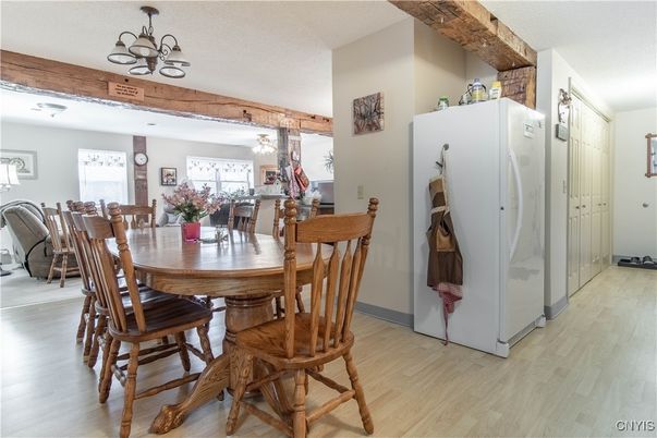 Chandelier, Dining room, Interior, Wood Texture Flooring