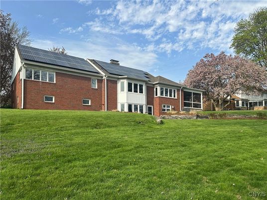 Backyard, Exterior, Facade, Brick Facade, Solar Panels, Brick Traditional