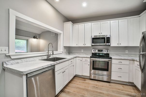 Interior, Kitchen, Recessed Lighting, Stainless Steel Appliances, Wood Texture Flooring
