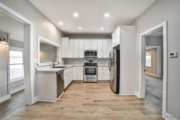 Interior, Kitchen, Recessed Lighting, Stainless Steel Appliances, Wood Texture Flooring