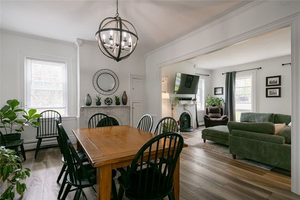 Chandelier, Dining room, Fireplace, Interior, Living room, Pendant Lights, Wood Texture Flooring