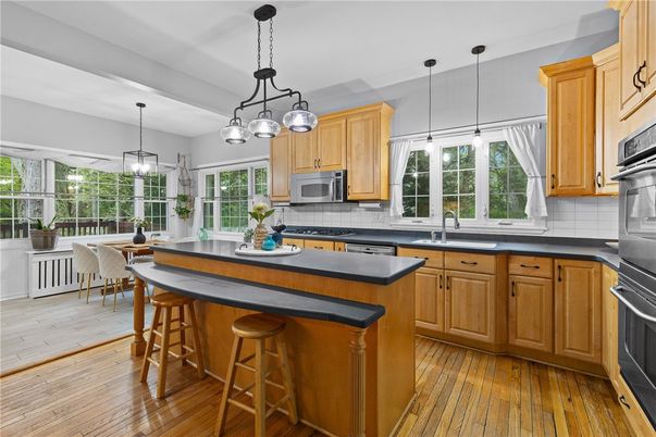 Dining room, Interior, Kitchen, Pendant Lights, Stainless Steel Appliances, Wood Texture Flooring