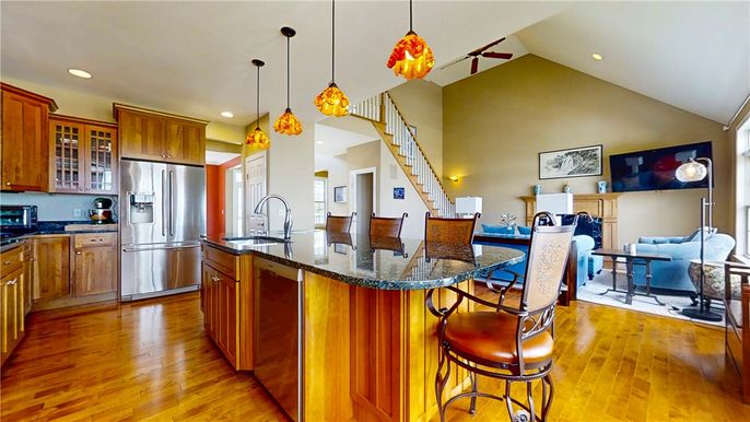 Dining room, Interior, Kitchen, Pendant Lights, Recessed Lighting, Stainless Steel Appliances, Wood Texture Flooring