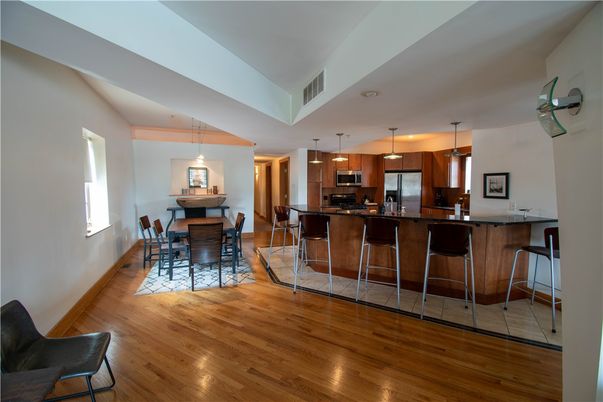 Dining room, Interior, Kitchen, Pendant Lights, Stainless Steel Appliances, Wood Texture Flooring