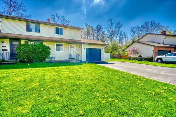 Attached, Backyard, Exterior, Facade, Brick Facade, Split Level