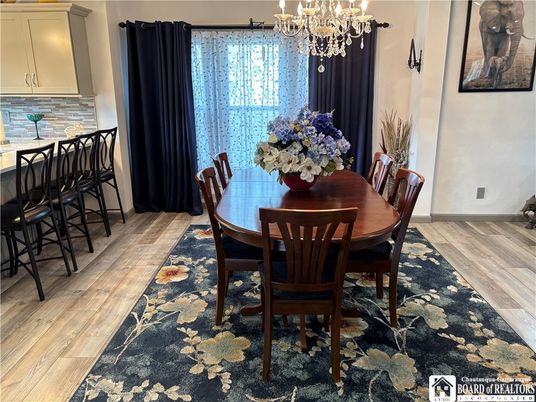 Chandelier, Dining room, Interior, Wood Texture Flooring