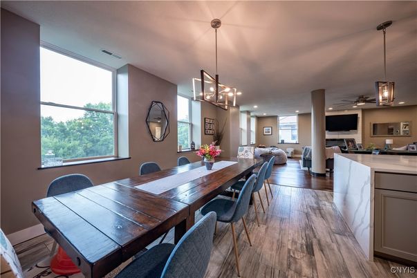 Dining room, Fireplace, Interior, Living room, Pendant Lights, Recessed Lighting, Wood Texture Flooring
