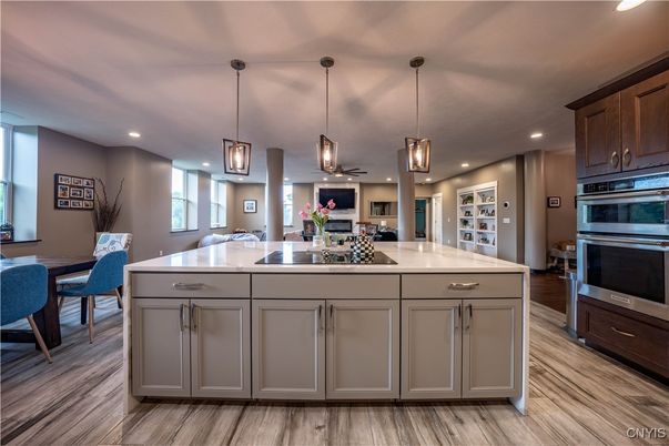 Dining room, Interior, Kitchen, Pendant Lights, Recessed Lighting, Stainless Steel Appliances, Wood Texture Flooring