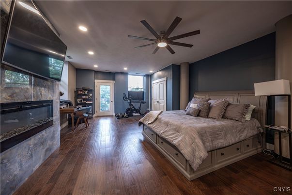 Bedroom, Fitness Equipment, Interior, Recessed Lighting, Wood Texture Flooring