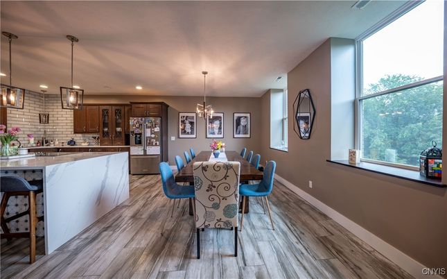 Dining room, Interior, Kitchen, Pendant Lights, Recessed Lighting, Stone Walls, Wood Texture Flooring