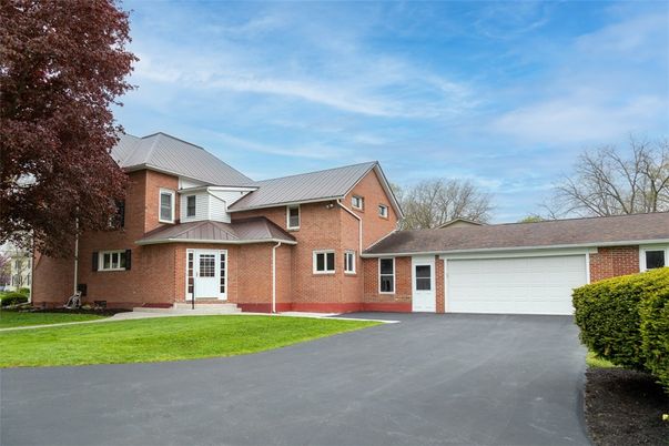 Attached, Exterior, Facade, Brick Facade, Brick Traditional