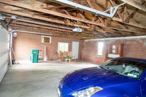 Garage, Interior, Stone Walls, Wooden Beams