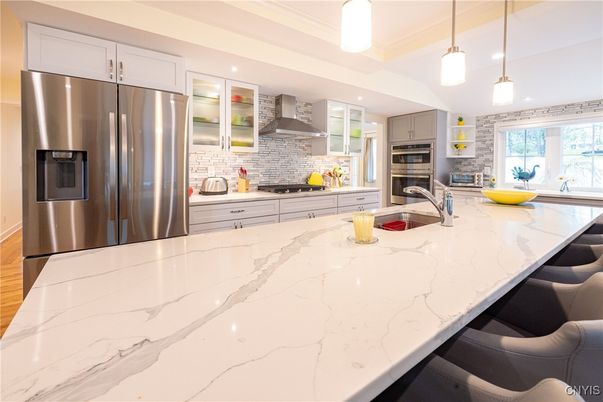 Interior, Kitchen, Pendant Lights, Recessed Lighting, Stainless Steel Appliances, Stone Walls, Wood Texture Flooring