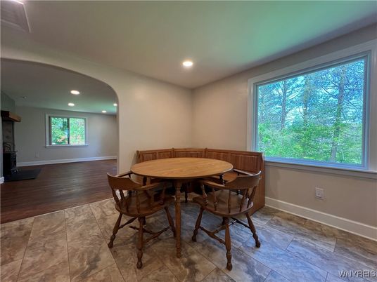 Dining room, Fireplace, Interior, Recessed Lighting, Wood Texture Flooring