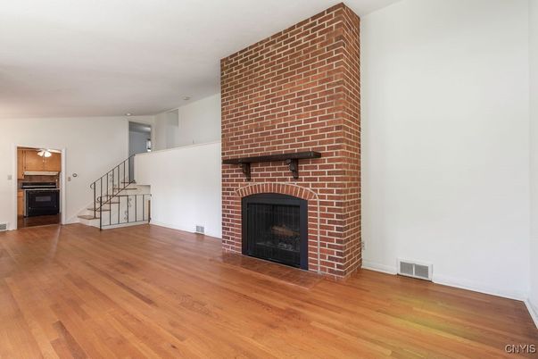 Empty room, Fireplace, Interior, Stone Walls, Wood Texture Flooring