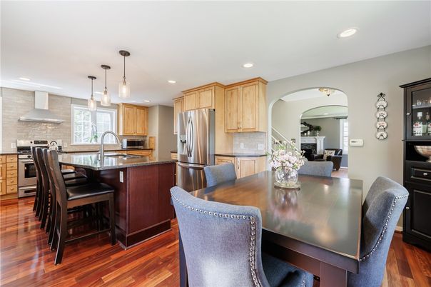 Dining room, Interior, Kitchen, Pendant Lights, Recessed Lighting, Stainless Steel Appliances, Wood Texture Flooring