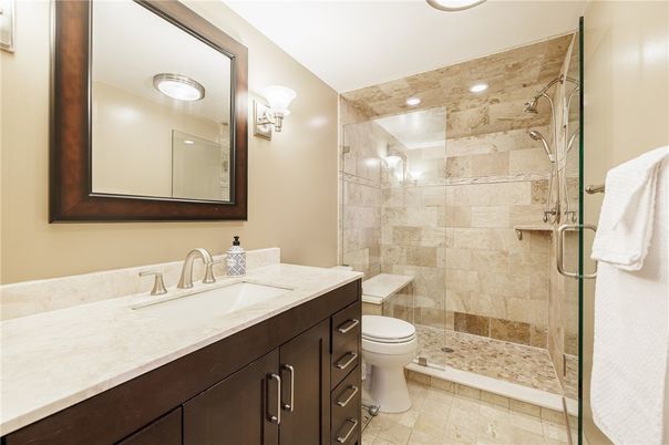 Bathroom, Glass Shower, Interior, Recessed Lighting, Stone Walls