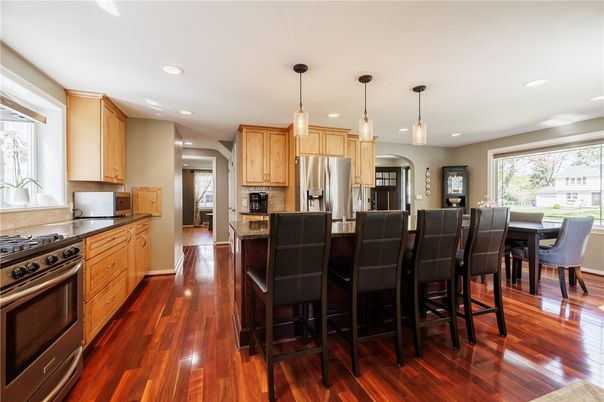 Dining room, Interior, Kitchen, Pendant Lights, Recessed Lighting, Stainless Steel Appliances, Wood Texture Flooring
