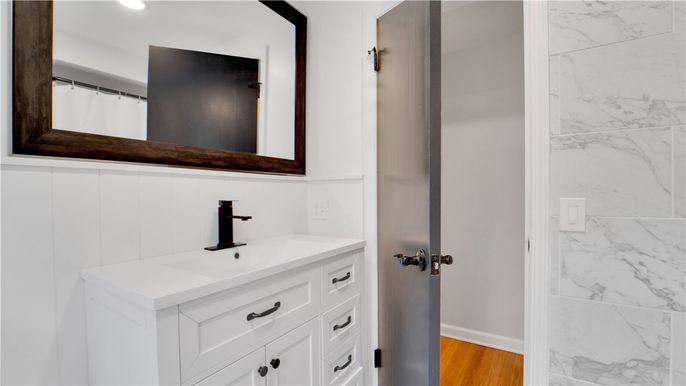 Bathroom, Interior, Marble Walls, Recessed Lighting, Wood Texture Flooring