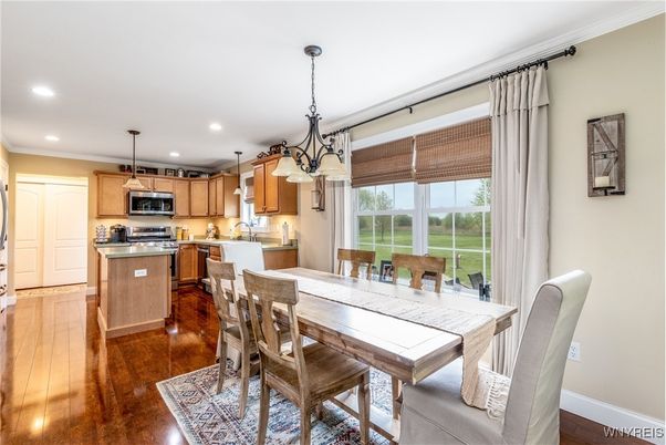 Dining room, Interior, Kitchen, Pendant Lights, Recessed Lighting, Stainless Steel Appliances, Wood Texture Flooring
