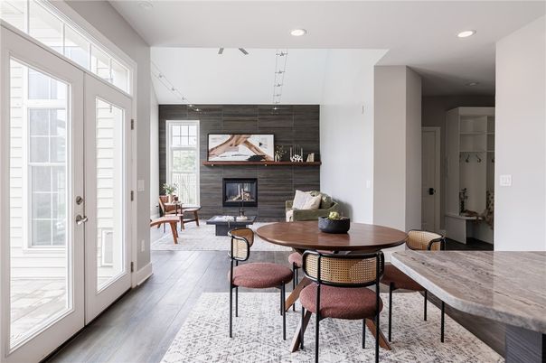 Dining room, Fireplace, Interior, Living room, Recessed Lighting, Wood Texture Flooring
