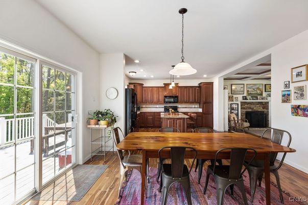 Dining room, Fireplace, Interior, Kitchen, Pendant Lights, Recessed Lighting, Wood Texture Flooring